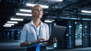 Female SaaS Manager reviewing performance